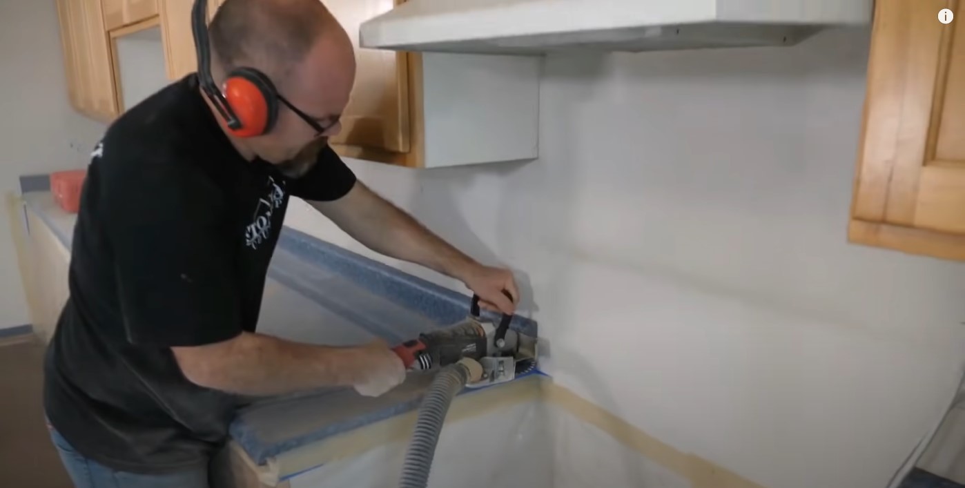 Cutting backsplash for gray epoxy countertop