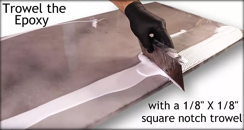 Trowel the epoxy with a square notch trowel